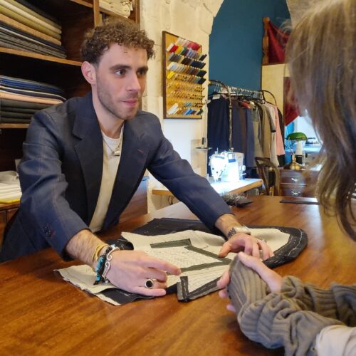 The tailor shows how to make a made-to-measure garment