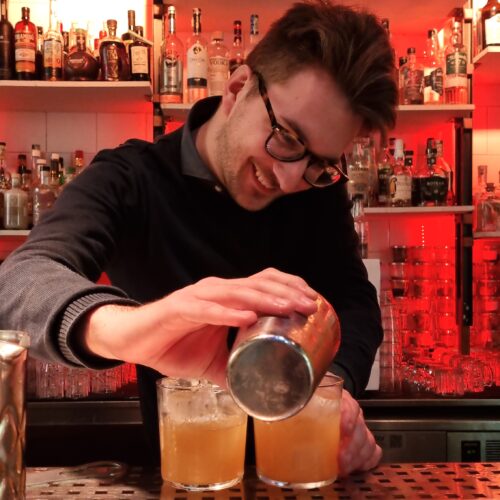 a guy just learned how to shake cocktails in the mixology class