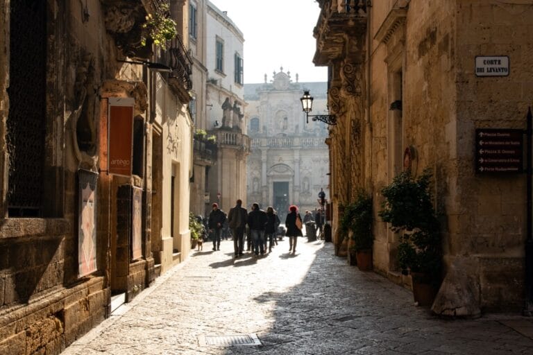 A glimpse of Lecce’s historic centre bathed in morning light, showcasing its stunning Baroque architecture