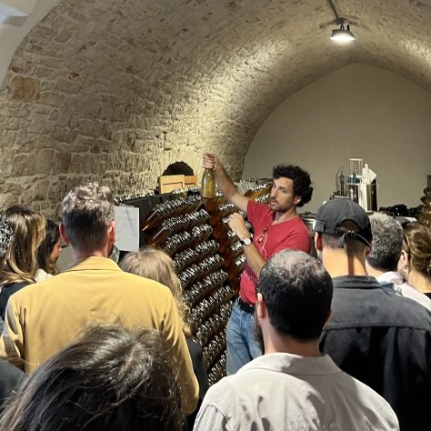 people visiting the old part of the natural wine cellar