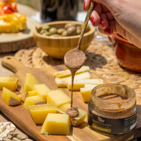 platter of local cheeses paired with organic almond creams to be enjoyed during the aperitif